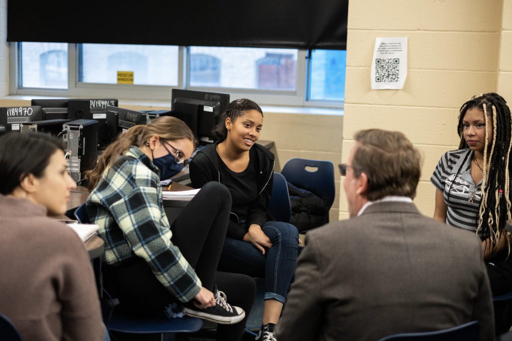 ITC Central Tech high school students meet with Syracuse University professors and staffers in December 2022 to share their experiences about dealing with misinformation.