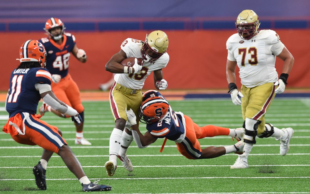 Boston College Eagles wide receiver Jehlani Galloway (13) is tackled by Syracuse Orange defensive back Ifeatu Melifonwu (2) during a game on Saturday, Nov. 7, 2020, at the Carrier Dome in Syracuse, N.Y.