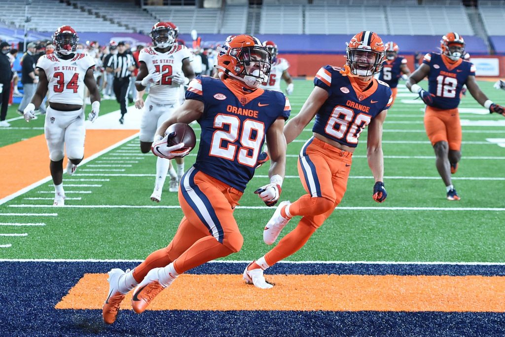 Syracuse Orange wide receiver Trebor Pena (29) runs back a kickoff for a touchdown during a game against North Carolina State on Saturday, Nov. 28, 2020, at the Carrier Dome in Syracuse, N.Y.