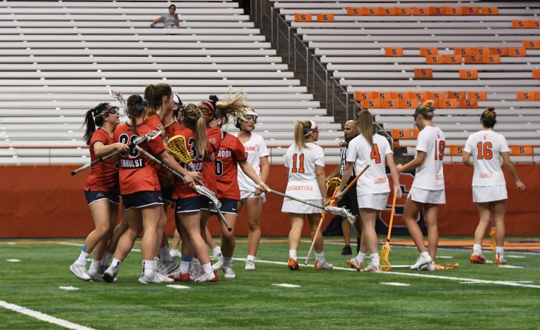 Stony Brook celebrates after a goal. The Seawolves scored 7 unanswered goals in the second half after the Orange tied the game at 9.