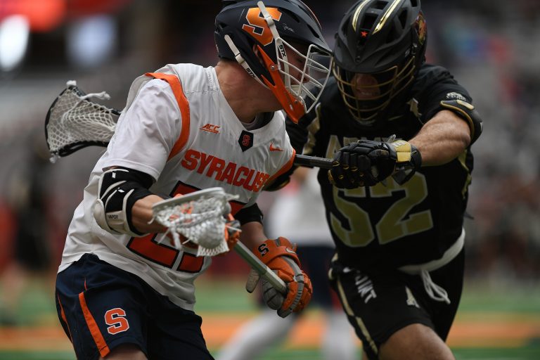 Syracuse’s Tucker Dordevic tries to get around Army’s Matthew Horace during the game at the Carrier Dome on Feb. 23, 2020.