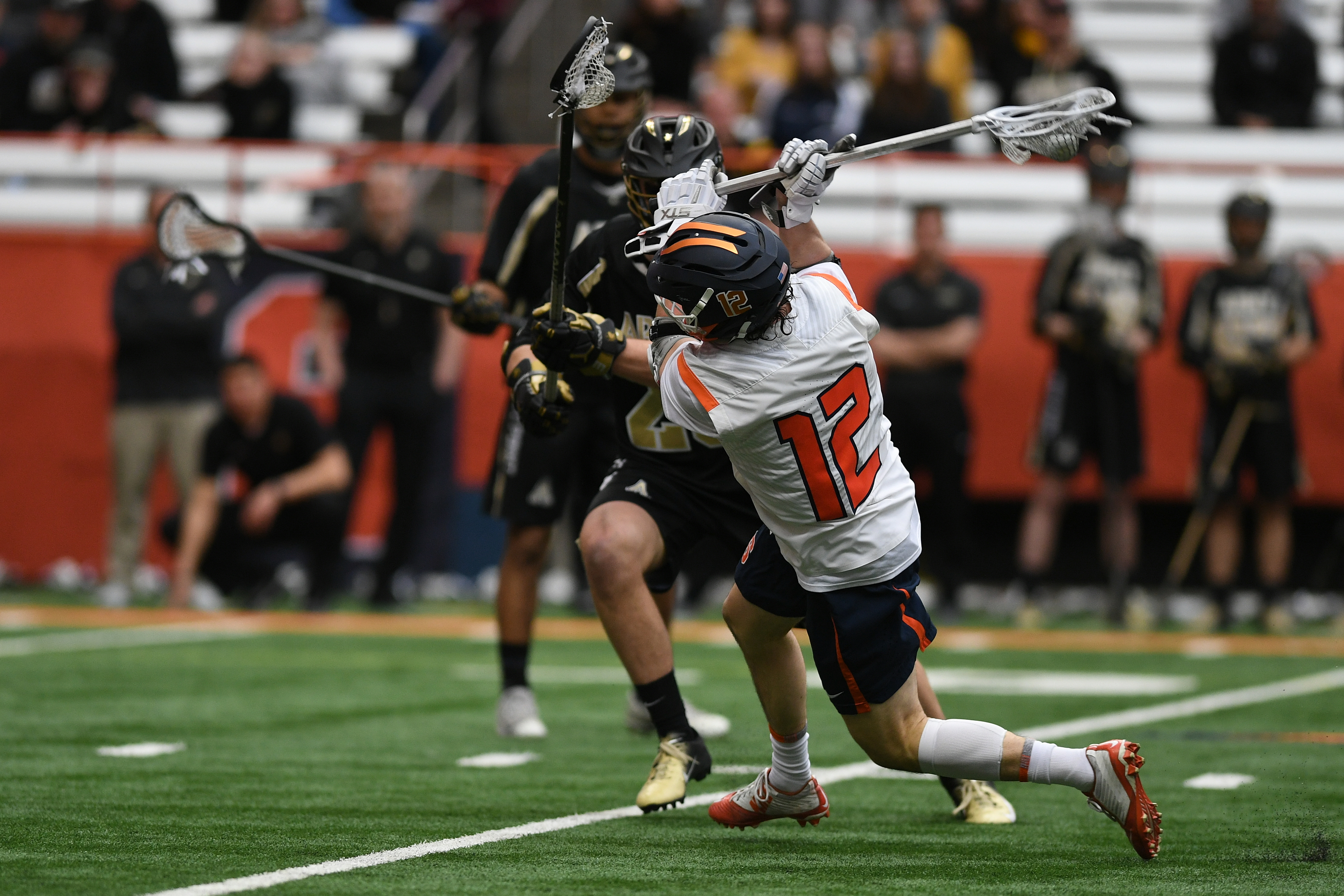 Jamie Trimboli winds up to shoot during the game at the Carrier Dome on Feb. 23, 2020. He led the game with 5 goals.