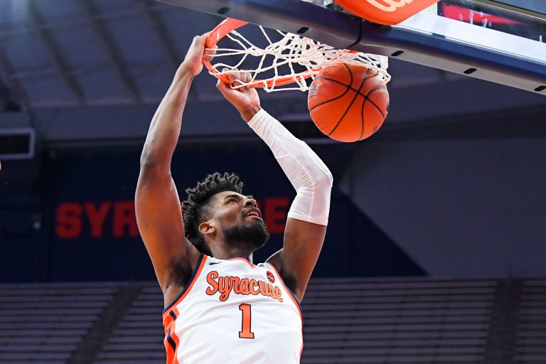 Dec 19, 2020; Syracuse, New York, USA; Syracuse Orange forward Quincy Guerrier (1) dunks the ball against the Buffalo Bulls during the first half at the Carrier Dome. Mandatory Credit: Rich Barnes-USA TODAY Sports
