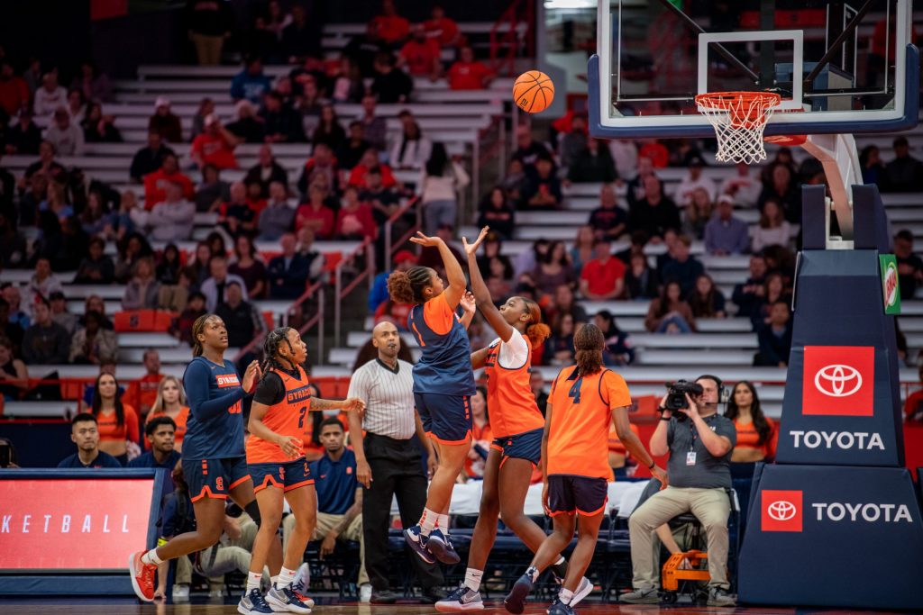 Freshman guard, Kennedi Perkins, rises up for a short range shot during the women's basketball scrimmage, at the Orange Tip Off fan event. Photo by Ryan Brady. 10/14/22
