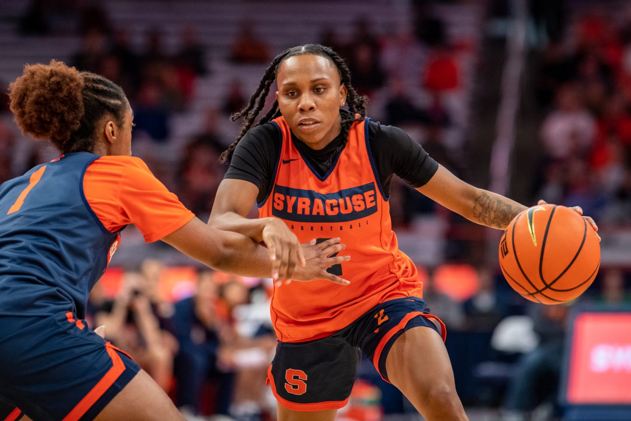 Senior guard, Dyaisha Fair, pushes past her teammate Kennedi Perkins during the women's basketball scrimmage, at the Orange Tip Off fan event. Photo by Ryan Brady. 10/14/22