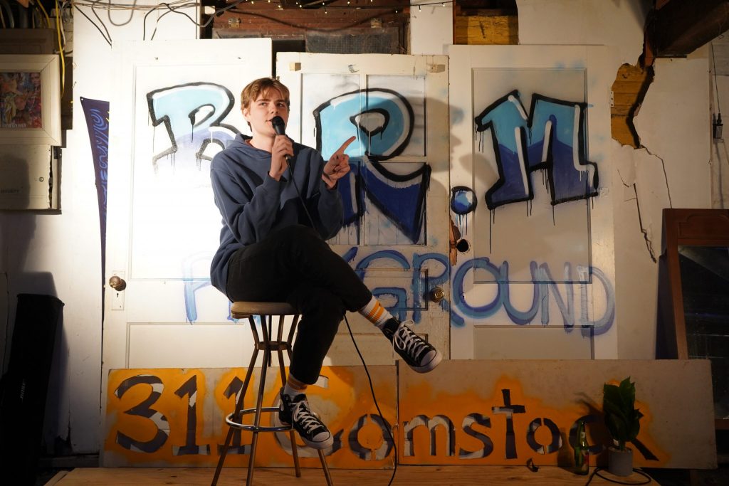 Griffin Palmer performs at The Playground comedy show