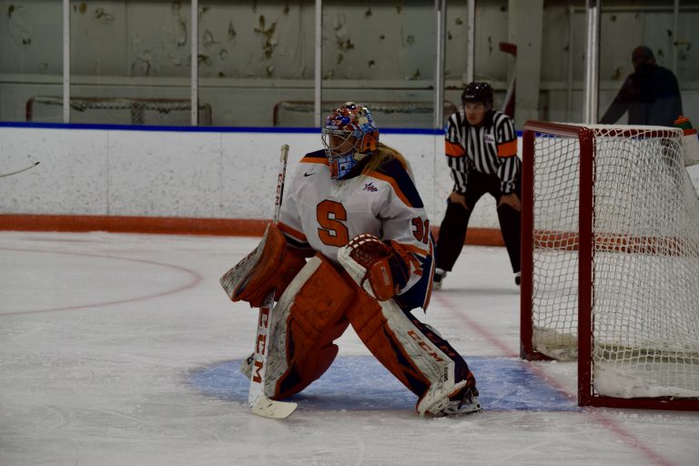 Syracuse goaltender prepares to defend the Orange goal before the faceoff during a game against Penn State on Dec. 11, 2020 at Tennity Ice Pavillion.
