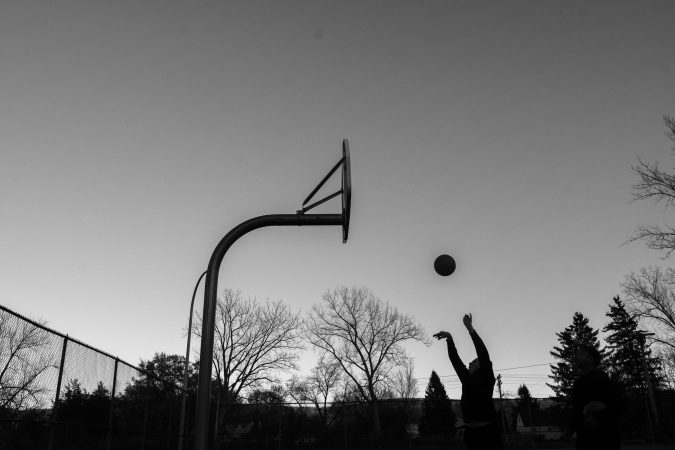 At the start of the pandemic, the city of Syracuse removed all of the rims from public basketball hoops and restricted hours of local green spaces.