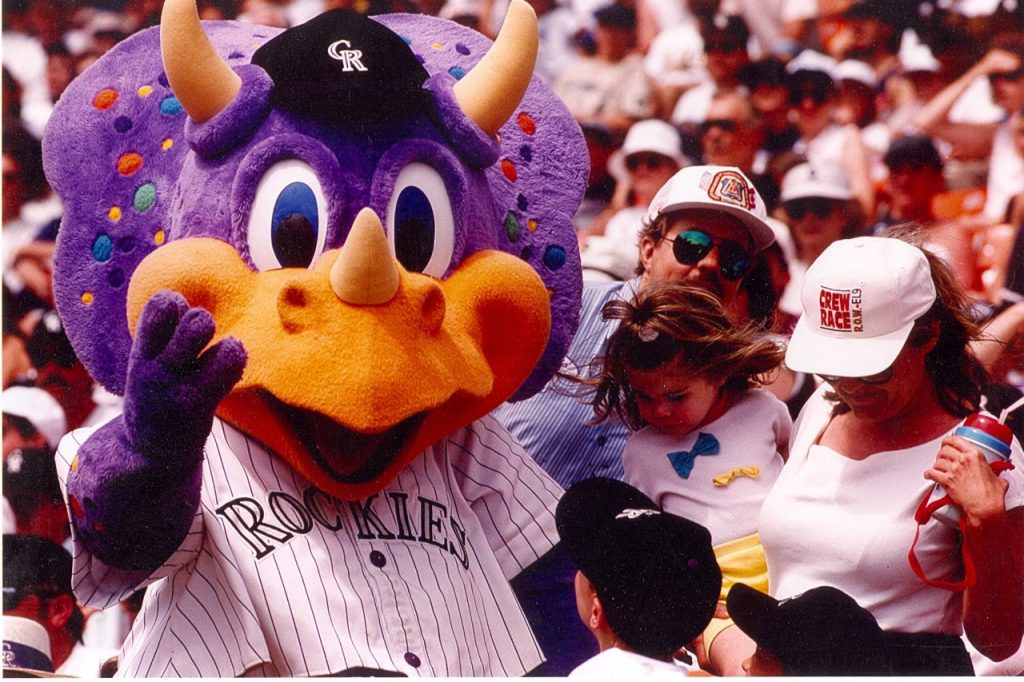 Joby Giacalone under the guise of Dinger the Dino, the Colorado Rockies’ first mascot.