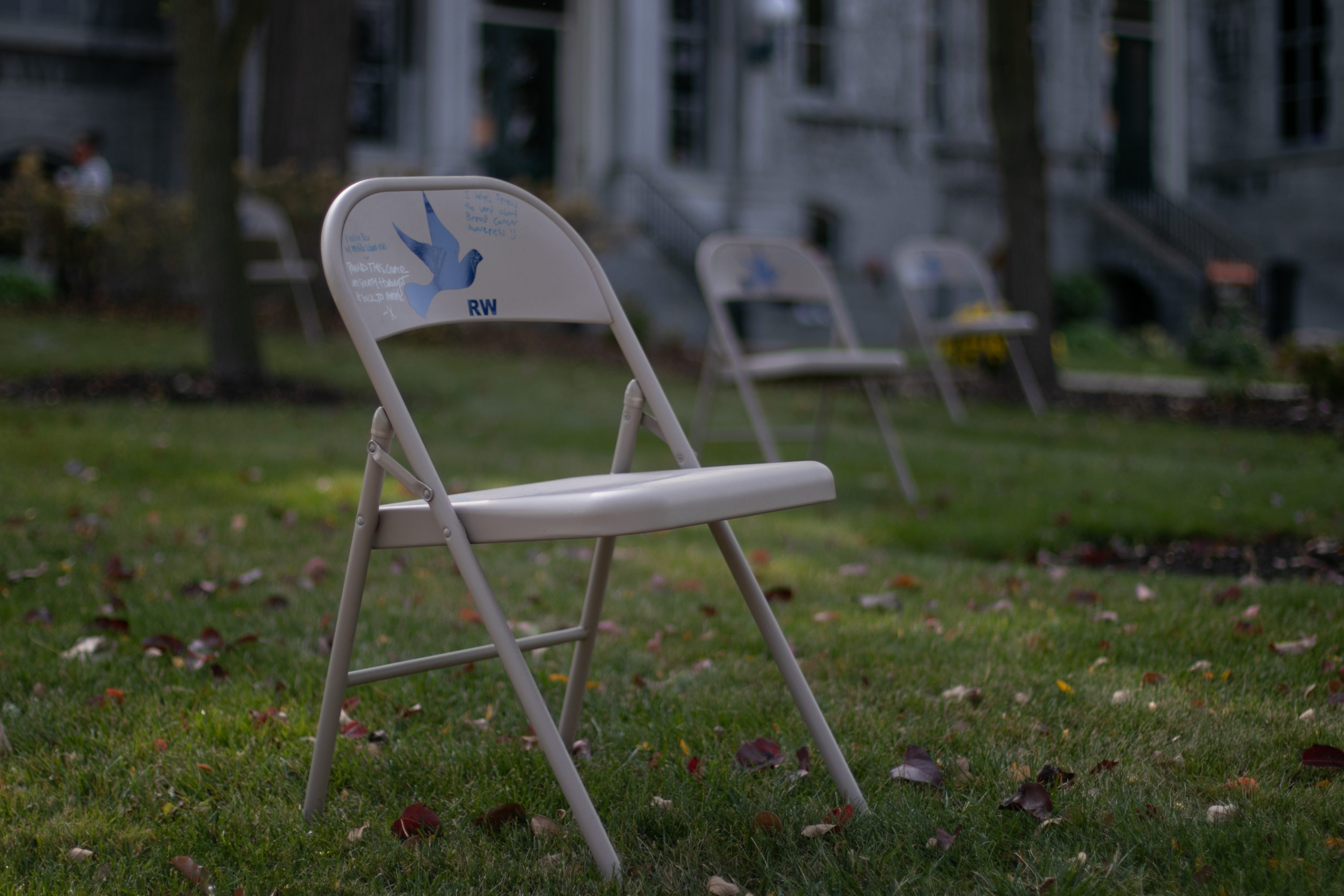 The 2020 Remembrance Scholars sit in front of SU's Hall of Languages from 1:25 pm to 2:01 pm to symbolize the time of flight for Pan Am Flight 103.