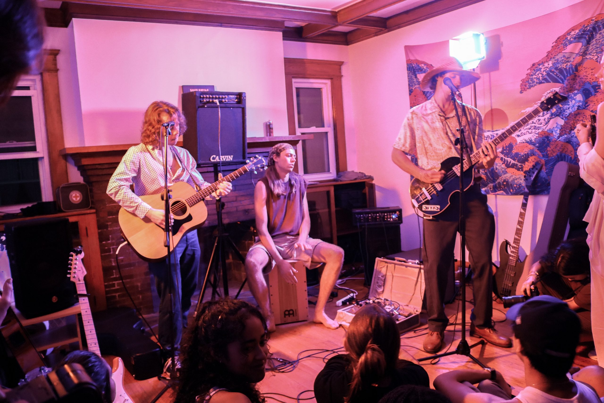 The band Knu performing at a house concert put on by Sofar Syracuse. Brett Turnquist (left), JP Abner (center), Spencer Hillman (right).
