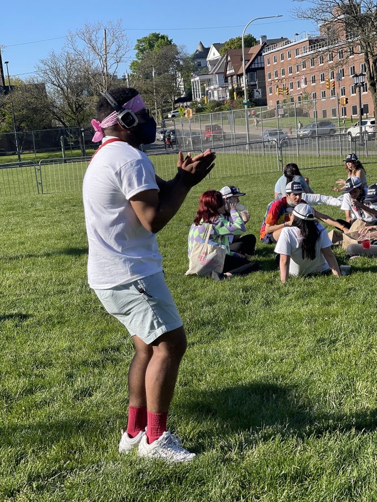 Silent Disco dancer outside SU's Women's Building at Block Party 2021