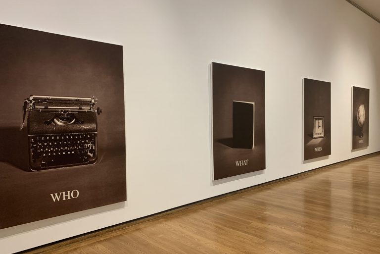 Carrie Mae Weems' original series titled "Who What When Where" photos of a typewirighter, a book, a clock, and a globe.