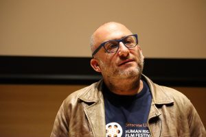 Director Alon Schwarz speaks at the Syracuse University Human Rights Film Festival.