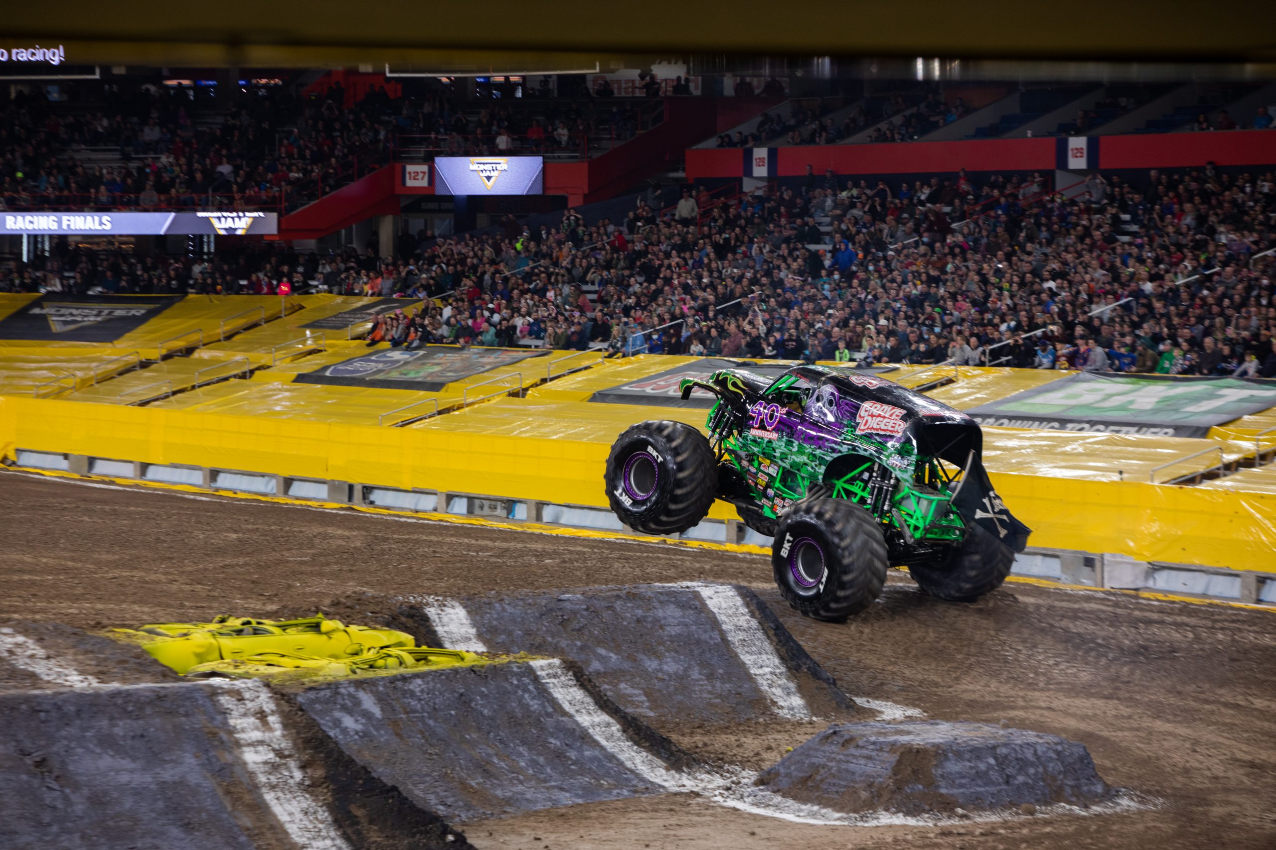 The monster truck "Grave Digger" launches into the air at Monster Jam Saturday Night in The Dome.