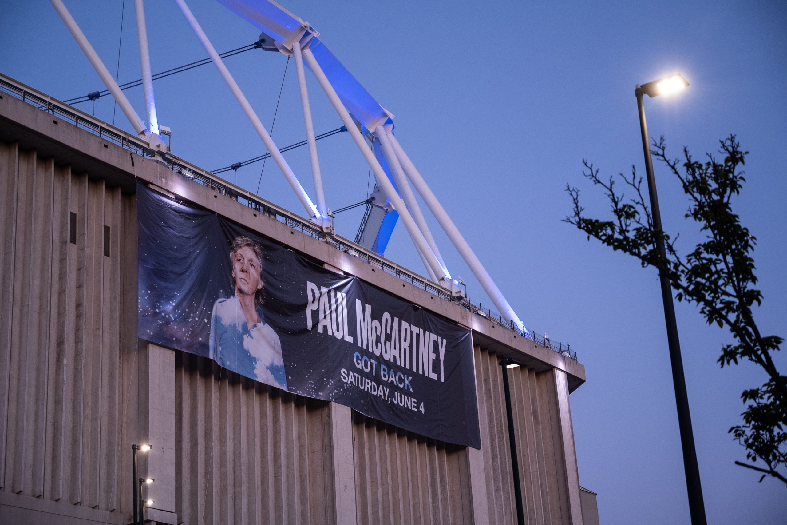 A sign promoting Paul McCartney's concert in Syracuse hangs on the west end of the JMA Wireless Dome in Syracuse, NY on June 4, 2022. McCartney played in Syracuse as part of a 13-city North American tour.