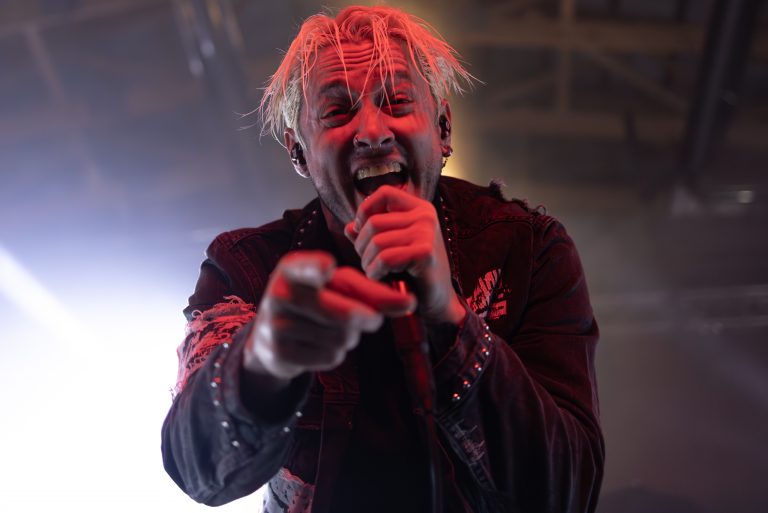 The Word Alive vocalist Tyler Smith interacts with the crowd during "The Blackout Tour PT.1" at Sharkey's Event Center in Liverpool on Friday November 24, 2023.