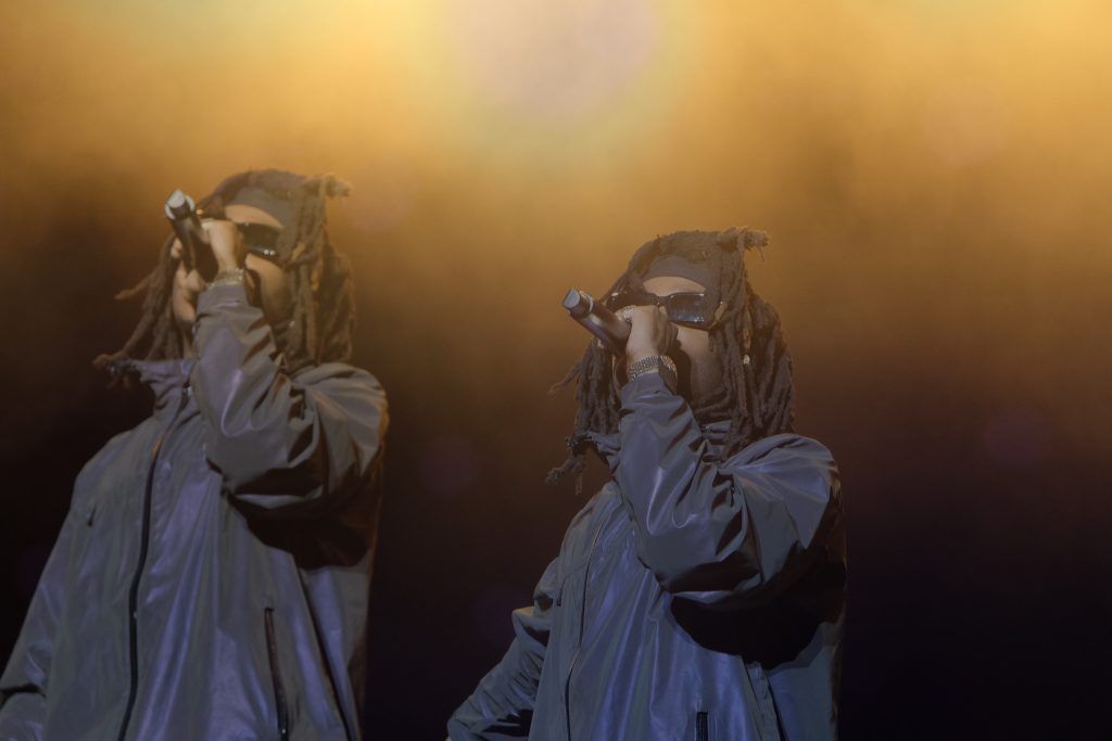 A double exposure of JID as he opens with his song 
