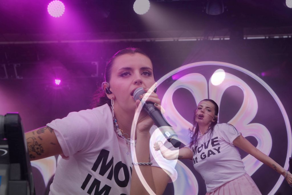 A double exposure of singer Rebecca Black performing Aug. 25 at the Suburban Park Stage at the 2023 New York State Fair.