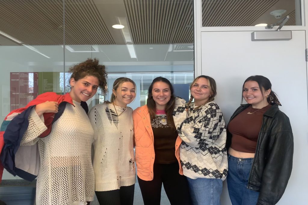 Syracuse University students show off styles based on vintage and secondhard stores.