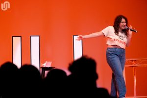 Zoe Green on the Goldstein Auditorium stage for the Orange After Dark Comedy Carnival hosted by the University Union on Friday night.