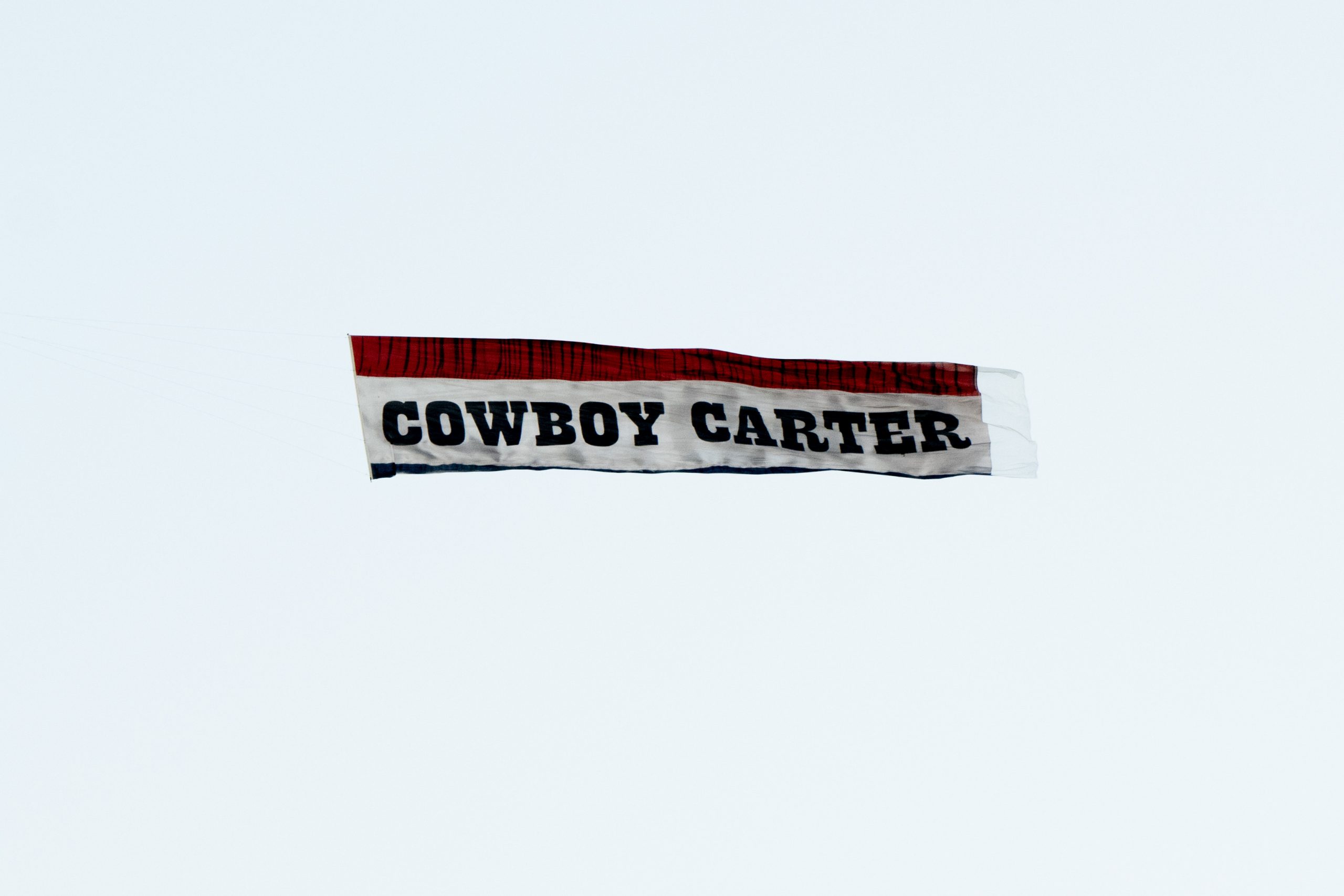 A banner promoting Beyonce "Cowboy Carter" is seen overhead during Day 2 of Stagecoach Festival at Empire Polo Club on April 27, 2024 in Indio, California.