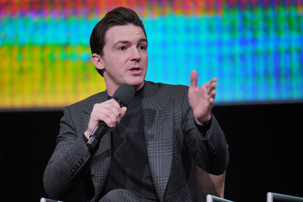 Drake Bell speaks onstage during the 