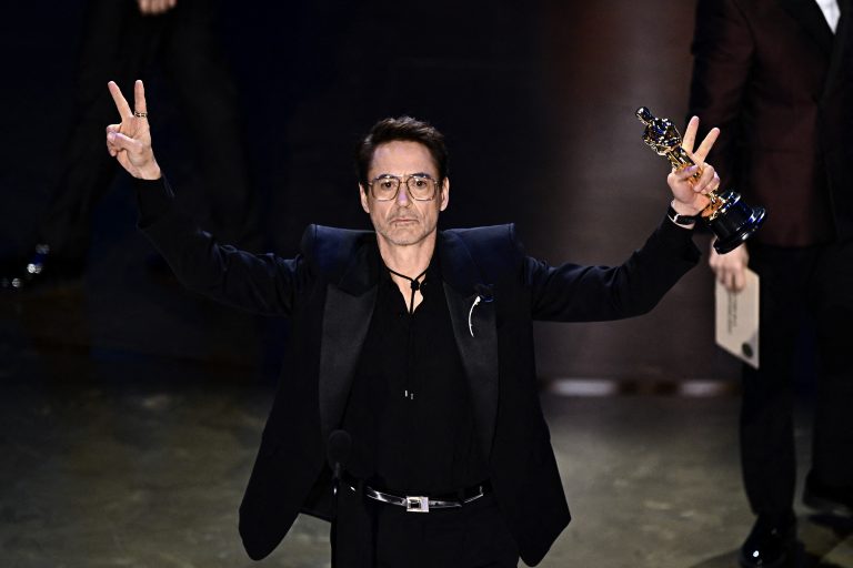 US actor Robert Downey Jr. accepts the award for Best Actor in a Supporting Role for "Oppenheimer" onstage during the 96th Annual Academy Awards at the Dolby Theatre in Hollywood, California on March 10, 2024.