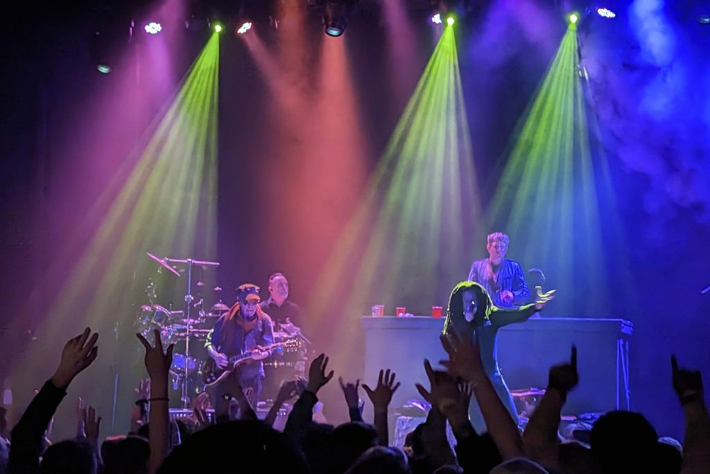 Singer Mr. Lif (right) leads the Thievery Corporation crowd at the Westcott Theater on March 8, 2024