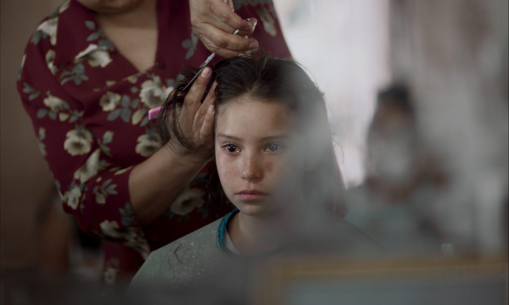 Ana Cristina Ordóñez González as main character Ana has her hair cut in the film Prayers for the Stolen