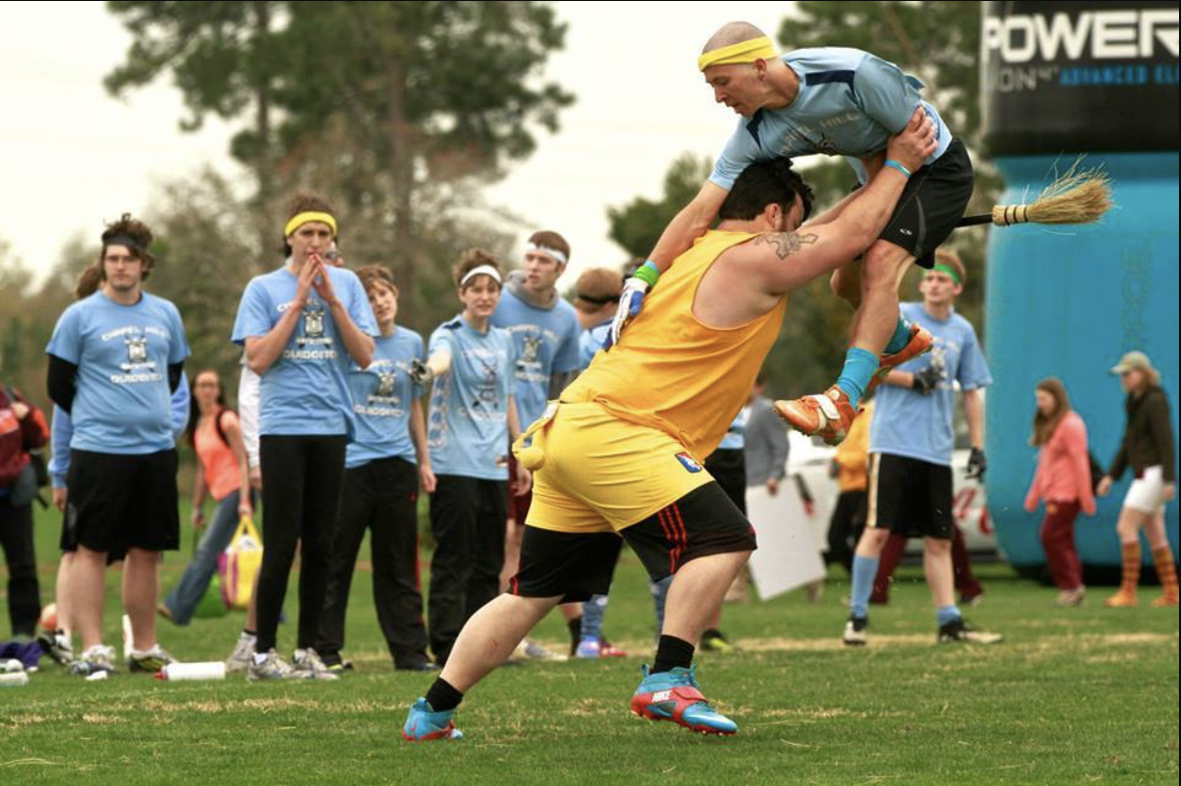 One person clashes with another during a game of Quidditch.