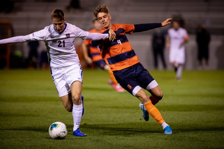 Noah Singelmann, who scored Syracuse men's soccer's second goal late in regulation to force overtime, battles for possession in the Oct. 6, 2020, home game vs. Pitt.