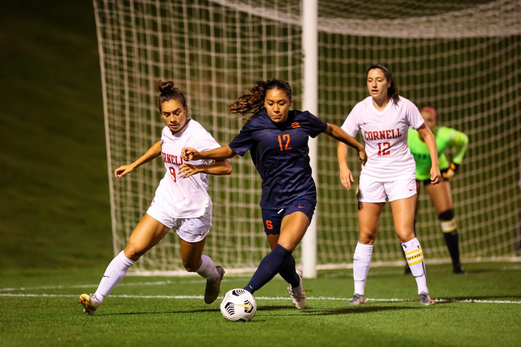 Cornell's Emily St. John, Syracuse's Telly Vunipola and Cornell's Naomi Jaffe battle for the ball in the Big Red's 6-yard box during a Women's Soccer game at SU Soccer Stadium on September 9, 2021.