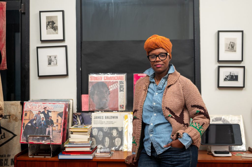 Cjala Surratt is the owner of the Black Citizens Brigade in downtown Syracuse. She curates vintage clothes and holds a large collection of records and books by famous Black authors, artists, and musicians.