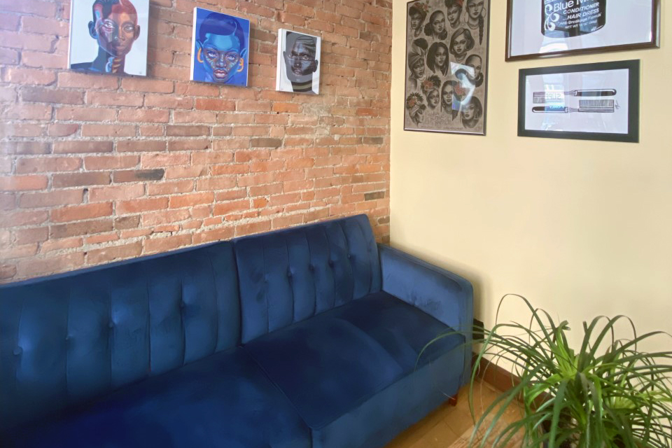 Couch and sitting area at 210 Teas in downtown Syracuse