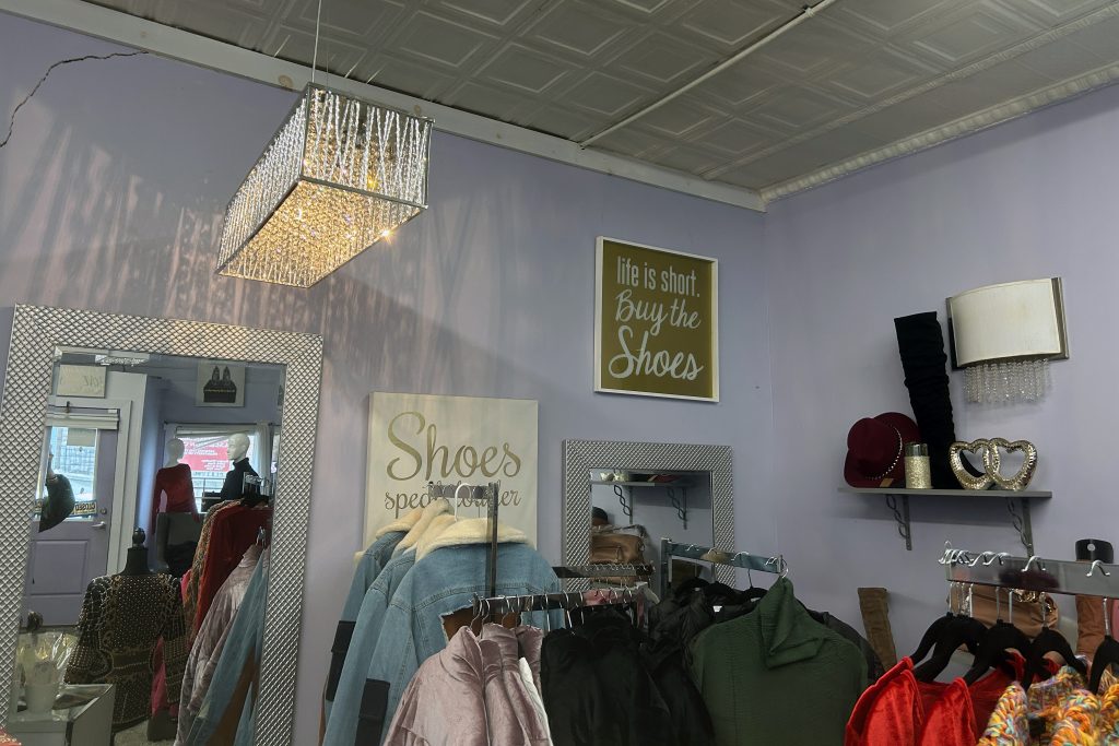 Interior of Experience the Love clothing store in downtown Syracuse.