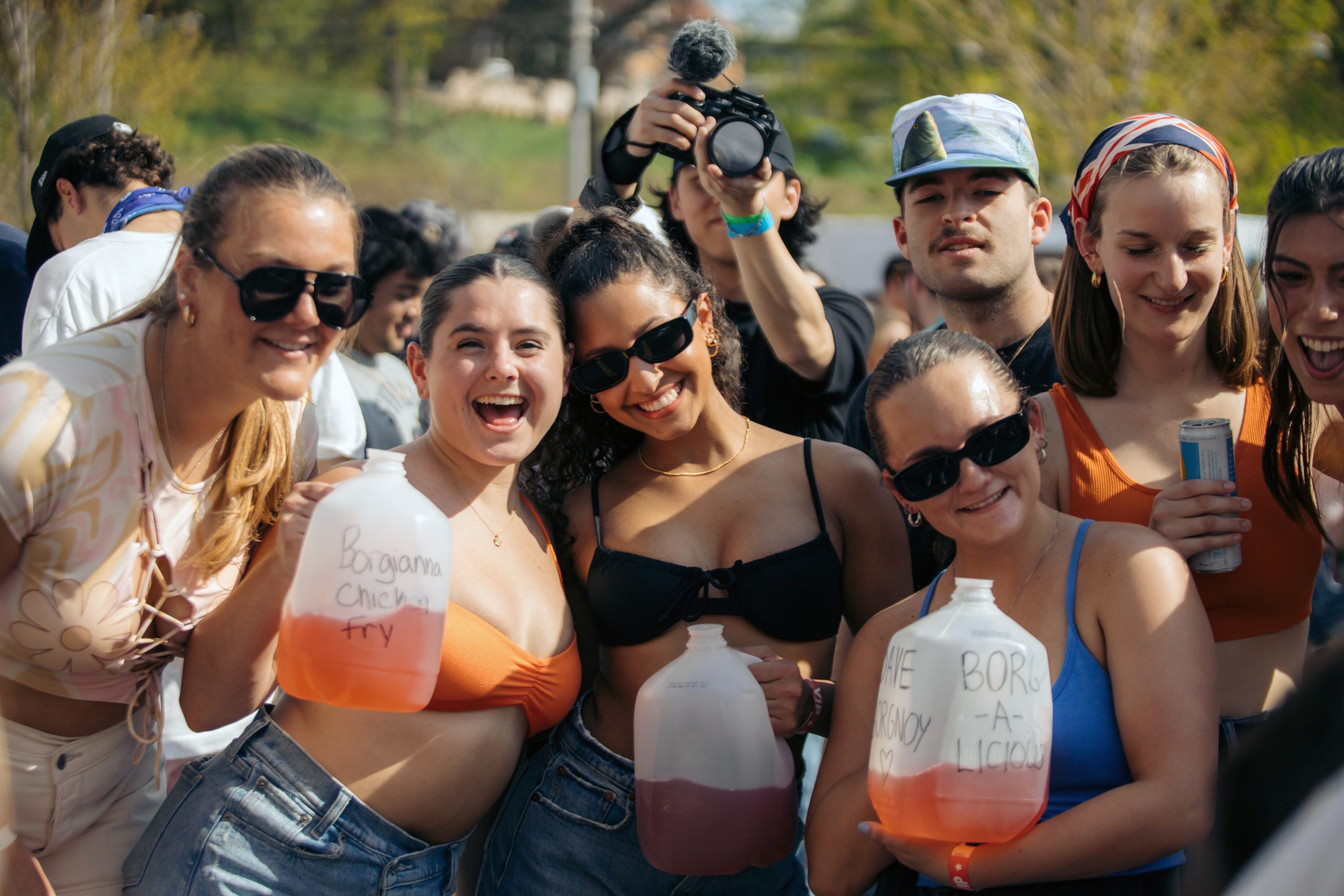 Students pose outside holding borgs