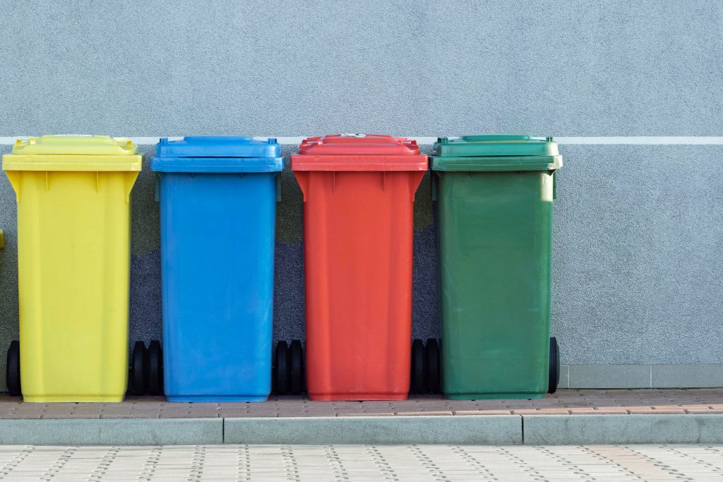 Colorful trash bins outside