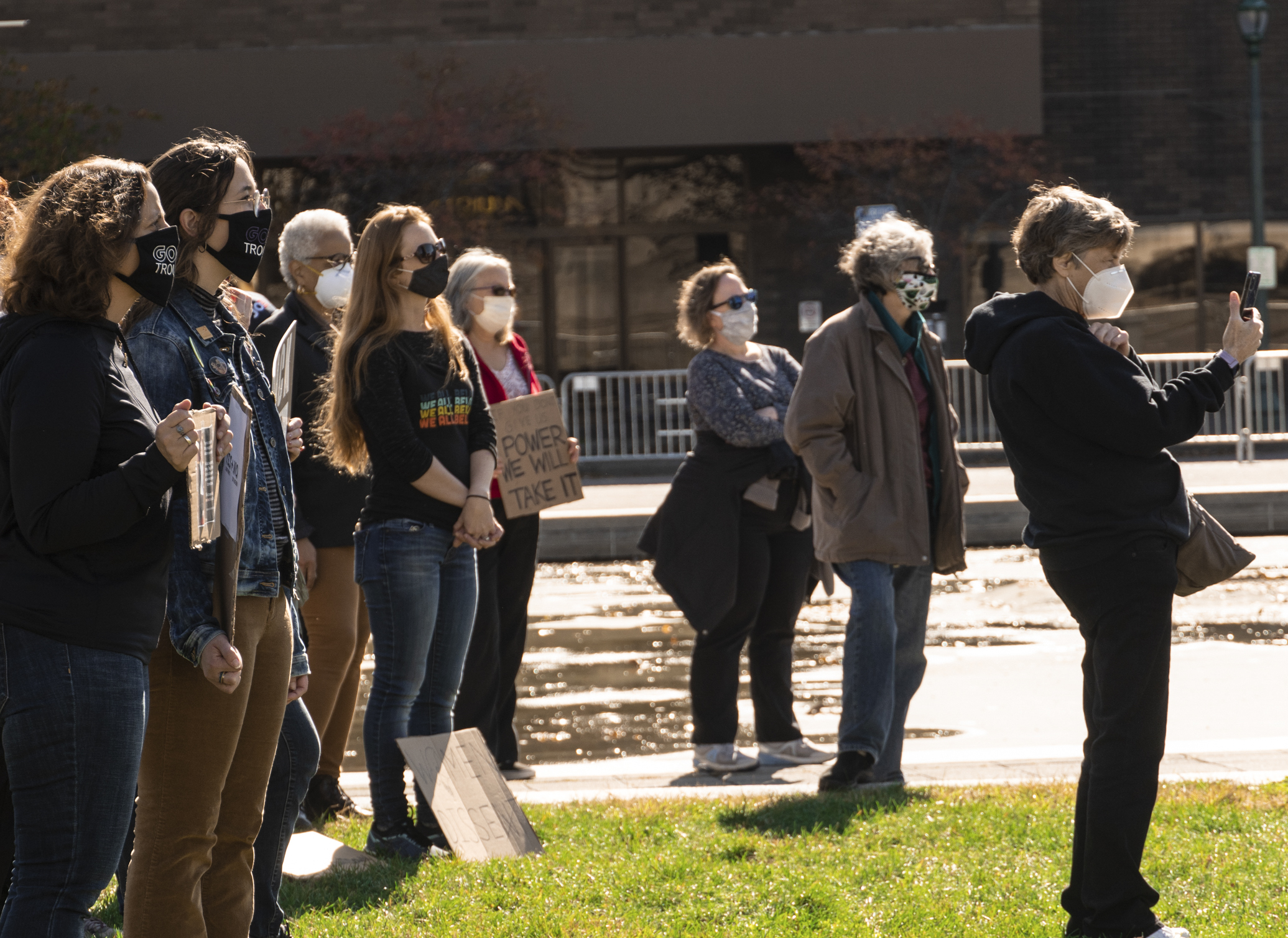 Protesters gathered on the lawn at Clinton Square Satruday afternoon. The event lasted around an hour and half. Masks and social distancing were required of attendees. (Photo by Patrick Linehan)