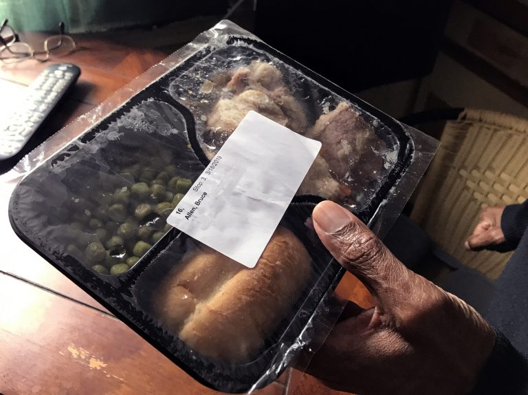 Bruce Allen holds one of his meals from Meals on Wheels. Sometimes, he’ll mix the meal with ingredients he has in his cabinets to create a new dish.