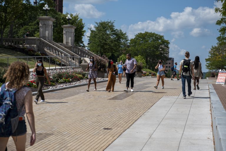 Students walk to class on the SU campus on the first day of school for the 2020-2021 school year.