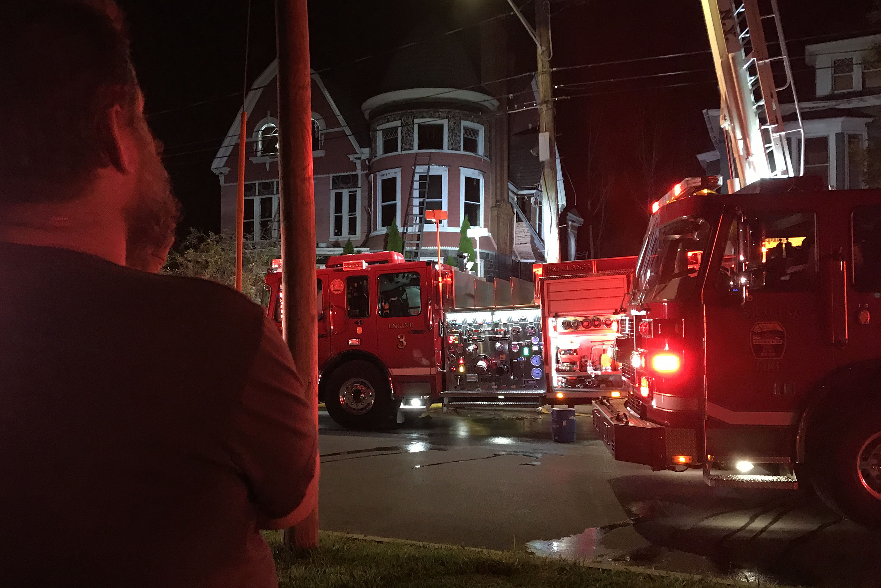Jeff Foley watches the "Pink Palace" House First at 749 W Onondaga Street on July 28, 2020.