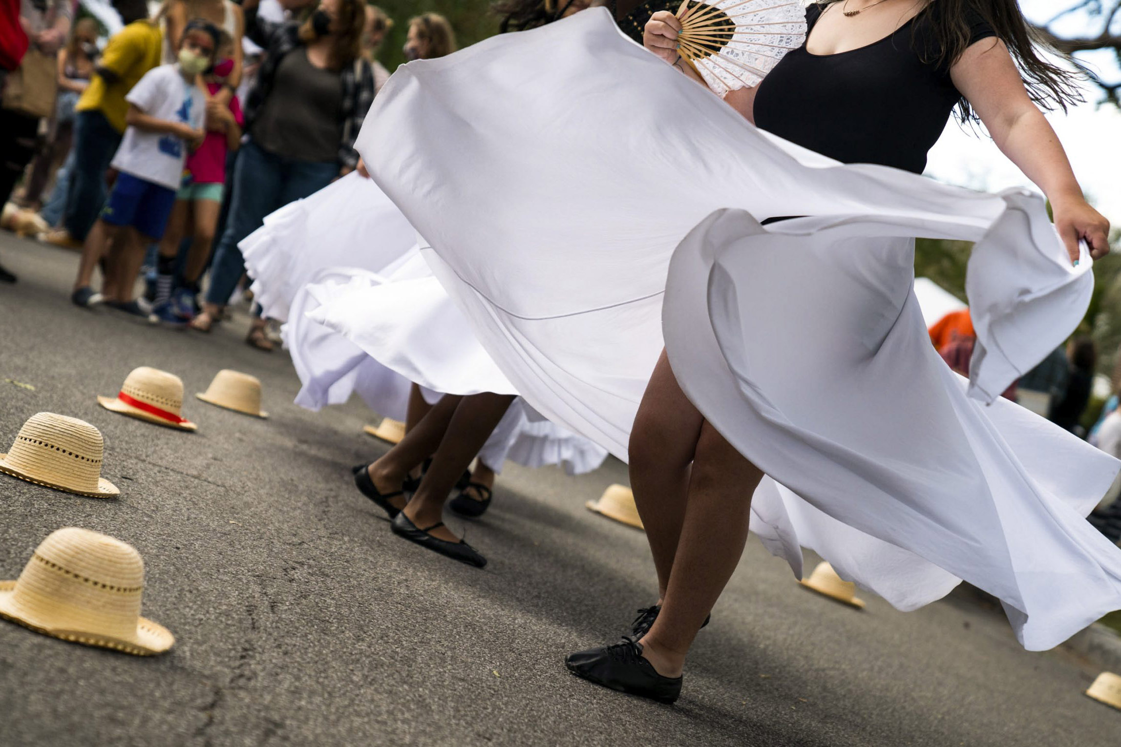 A local Latin dance group for girls performs on Victoria Place at the. Westcott Cultural Fair.