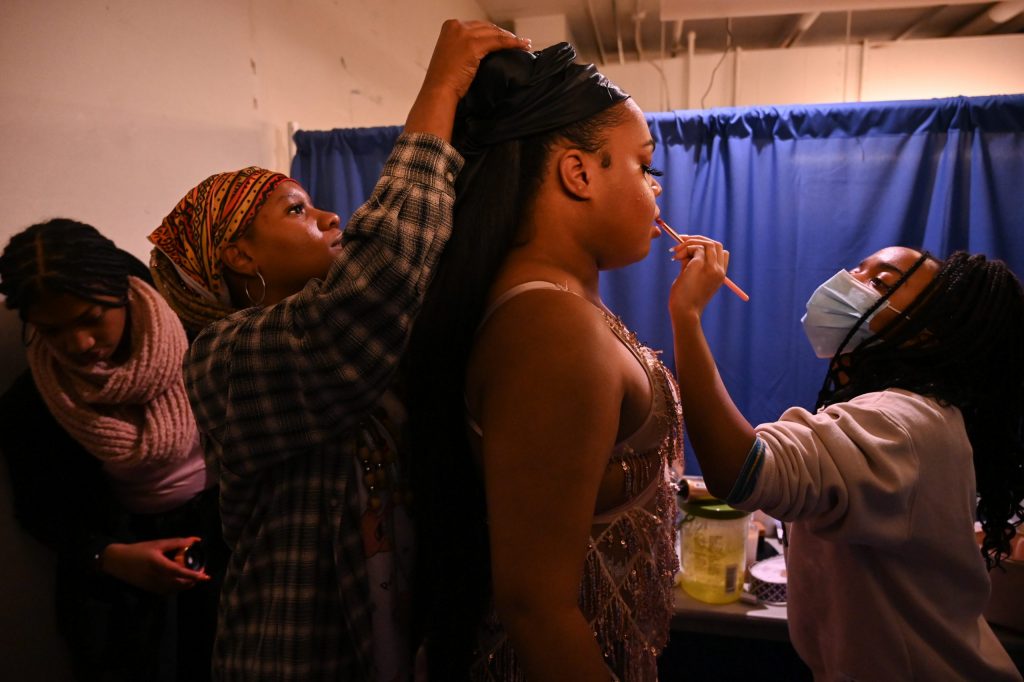 Dirty Lucciano gets ready backstage during Pride Union's 20th Annual Drag Show Finals in Goldstein Auditorium at Syracuse University on March 10, 2022. (Photo by Emma Vallelunga)