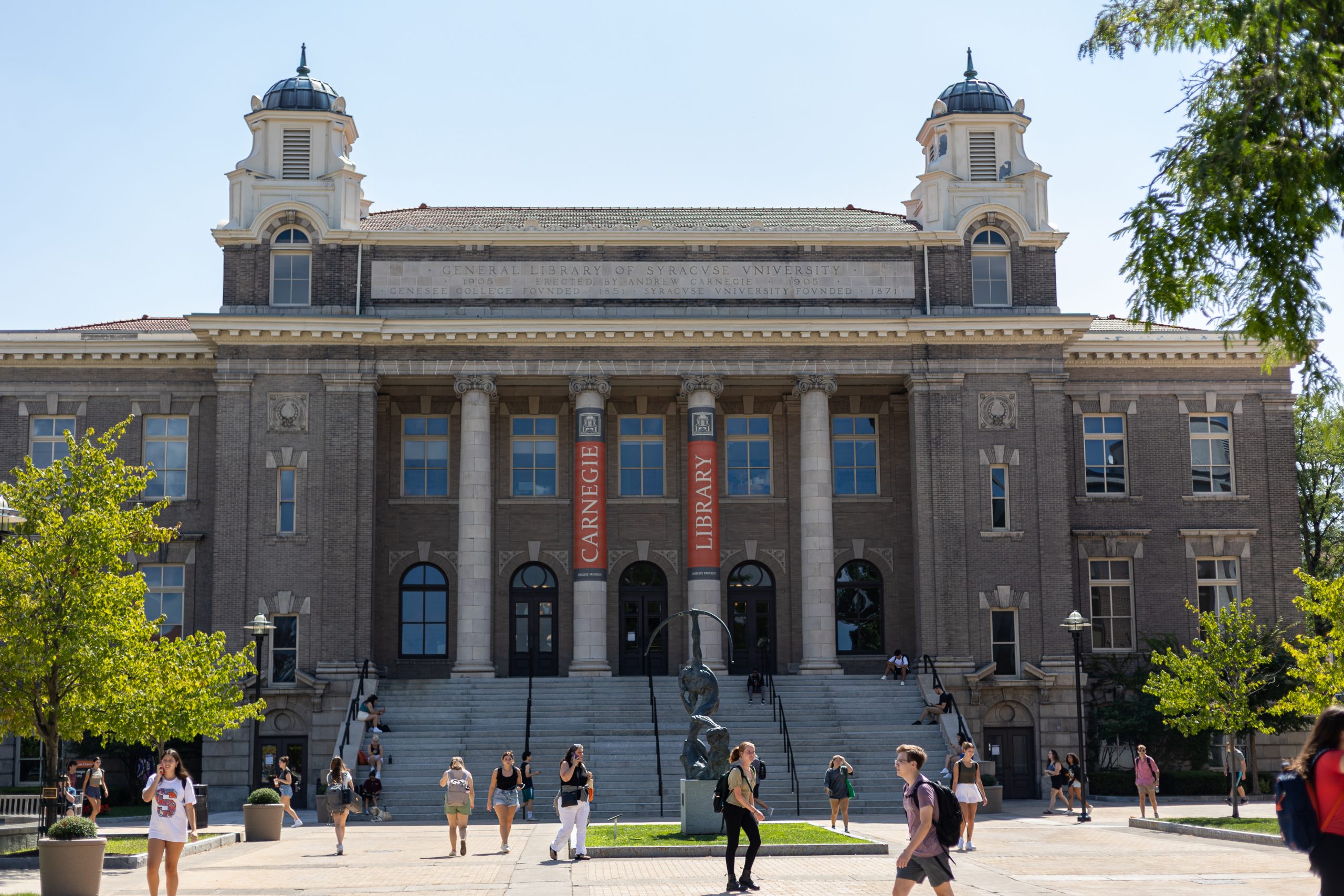Students walk past Carnegie Library on their way to class on the first school day of the year on Monday, August 29th, 2022.