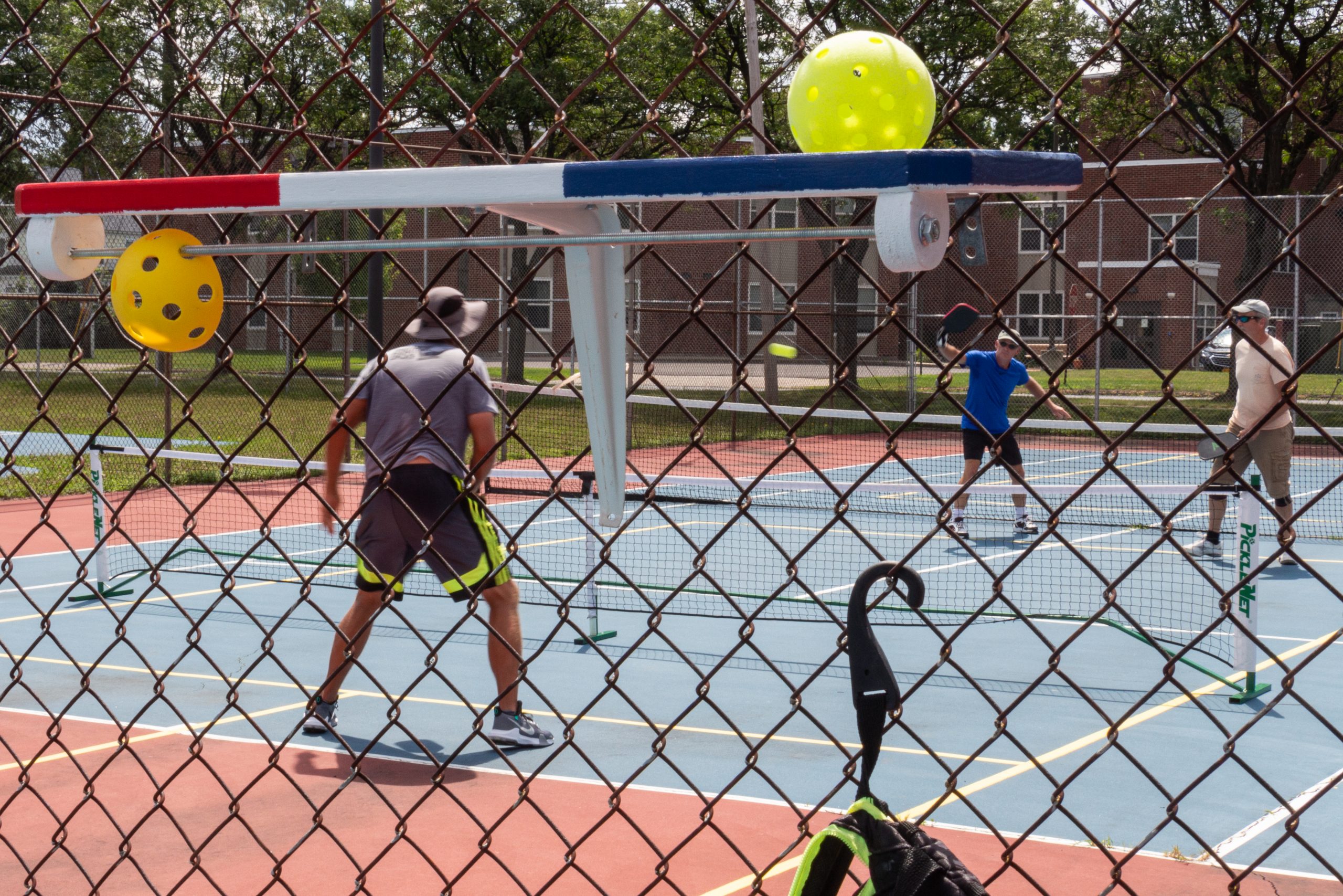 Players face off in a match at a recent pickleball tournament at Ellis Field Park.
