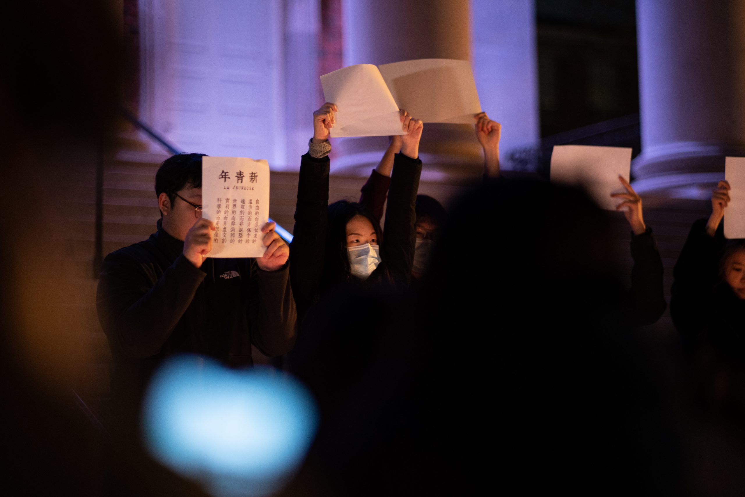 SU Students protesting with blank printing papers at the vigil outside of Hendricks Chapel on Nov. 28th, 2022.
