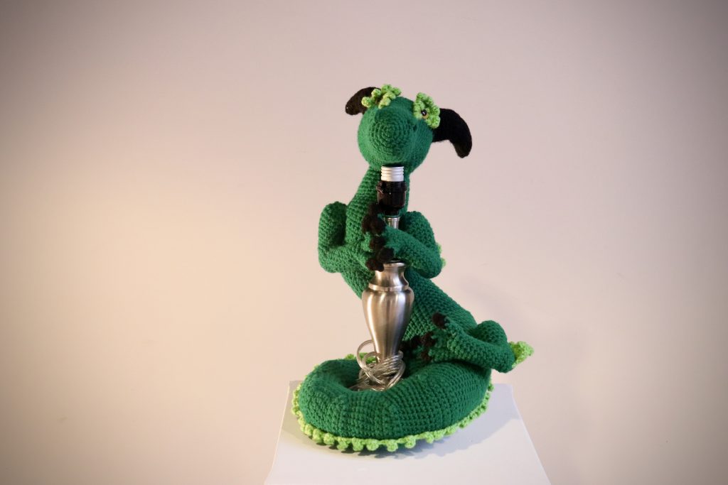 “Kai The Sneaky Scottish Dragon” crochet statue created by Laura Masuicca on display in the “Expressive Inclusion” art exhibition.