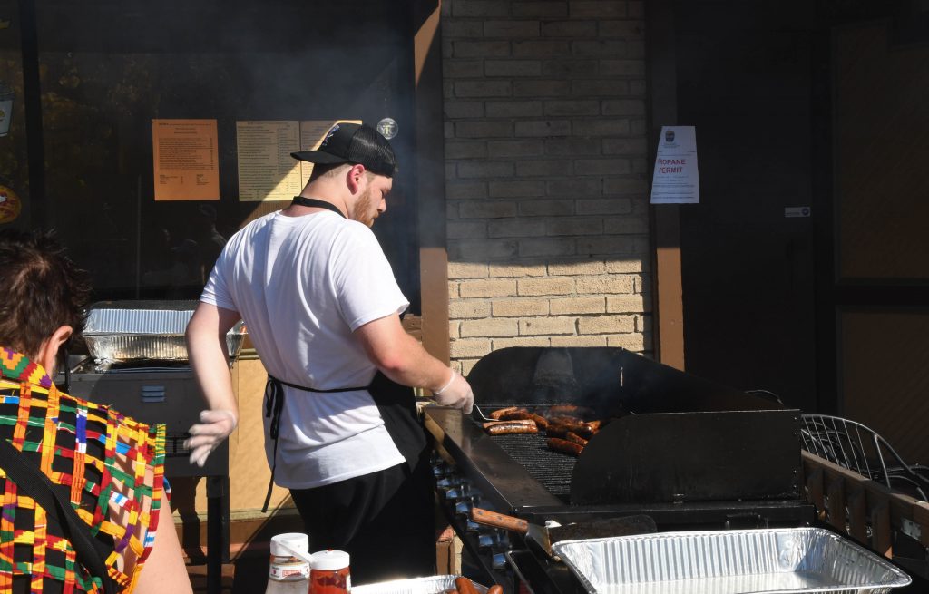 Much to the delight of hungry passerbys, Mom's Diner set up a grill to serve lunch outside their restaurant on Wescott St.