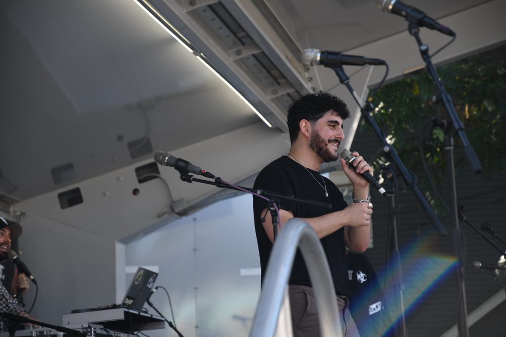 Zakary George, who goes by the stage name Zak G, performs Sink or Swim with collaborator Puji on the WAER Center Stage at the Westcott Street Cultural Fair on Sunday.